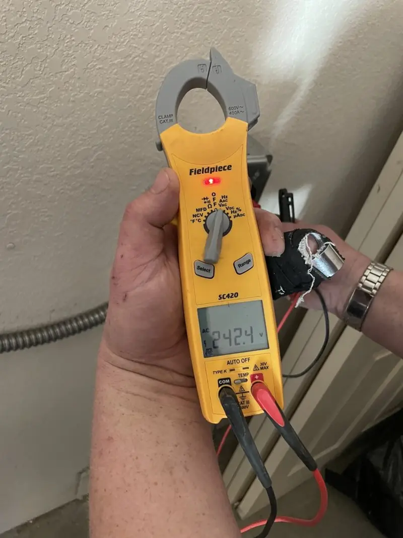 Voltage testing with clamp meter during Aluminum Wiring Replacement in Northfield